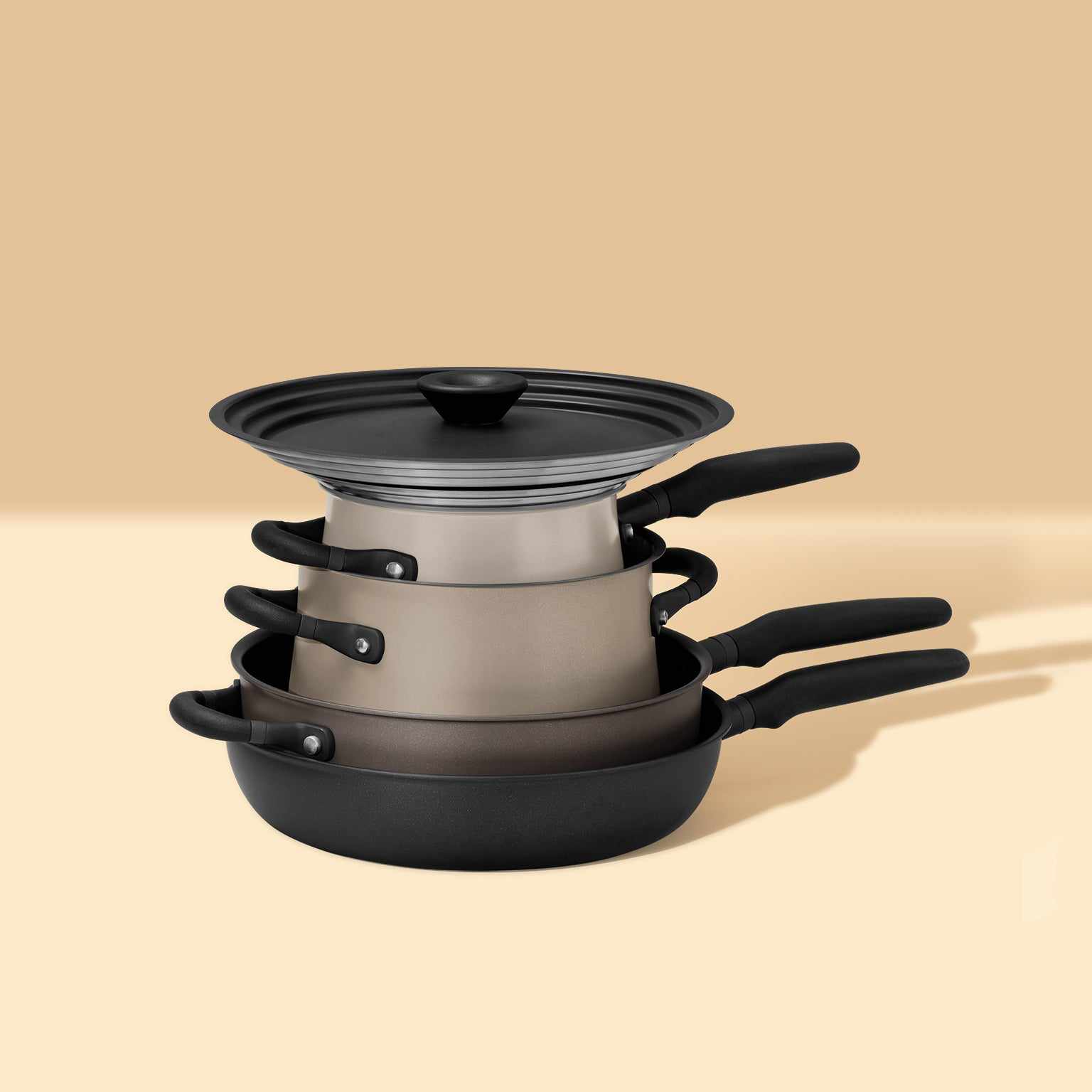 Stackable accent cinder and smoke cookware set in gray gradient tone