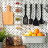 Cooking tool set with seasonings and fruits on wall hooks