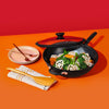 accent nonstick stirfry pan with glass lid and tablewares